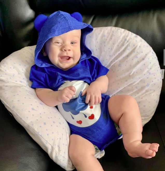 Baby Cody S wearing a baby snapsuit with hood